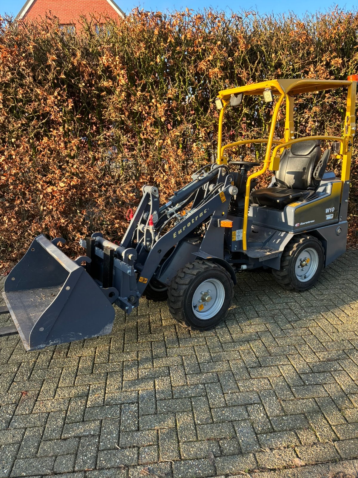 Eurotrac W10 wiellader, Articles professionnels, Enlèvement