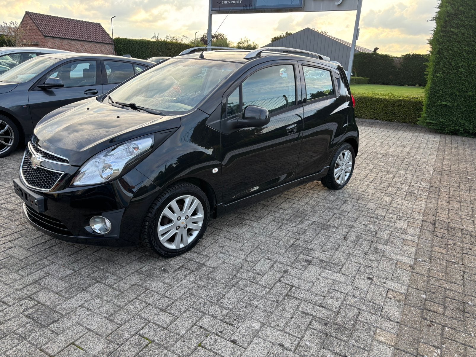 Chevrolet spark 2013 airco pdc, Auto's, Chevrolet, Voorwielaandrijving, 4 cilinders, Leder en Stof, Zwart