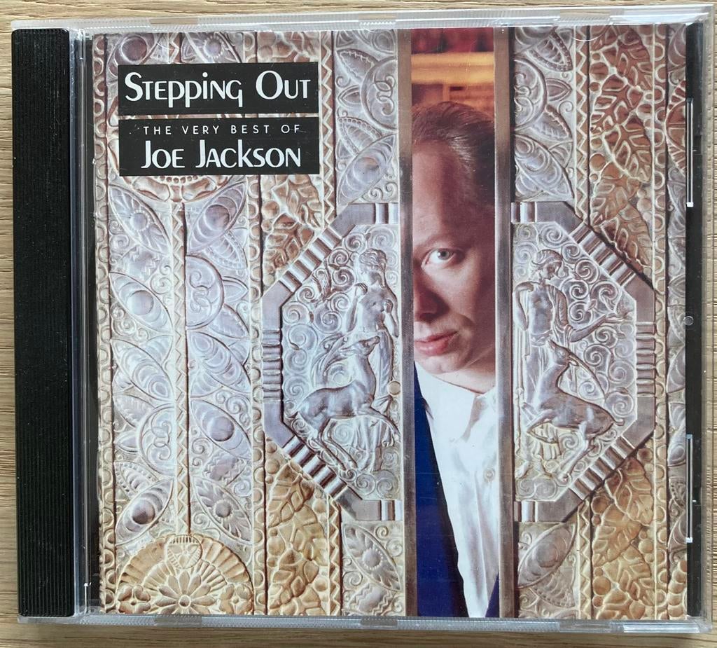 Joe Jackson - Stepping Out/The Very Best Of, Ophalen, Zo goed als nieuw