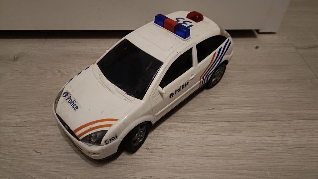Ford Focus MK1 politie 1/18, Ophalen of Verzenden, Gebruikt