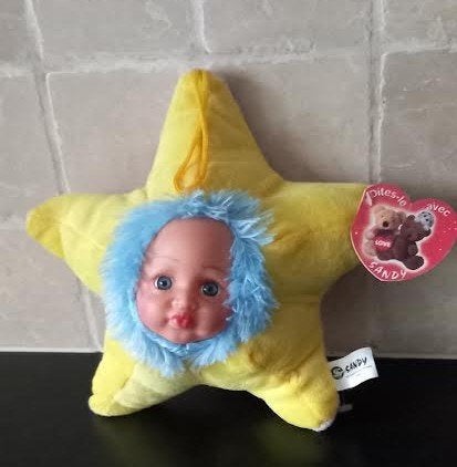 Knuffel Ster met een rubberen poppengezicht, Ophalen of Verzenden, Zo goed als nieuw, Met label