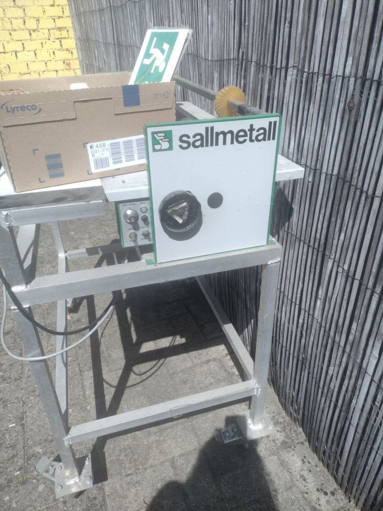 Sallmetall industriële lamineermachine, Ophalen
