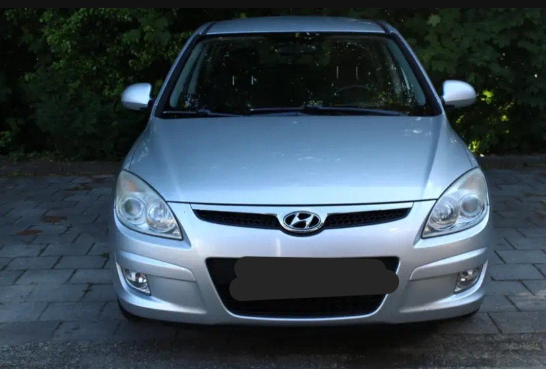 hyundai i30 1400cc benzine 1ste eigenaar  4 deurs  met airco, Voorwielaandrijving, 4 deurs, Stof, Zwart
