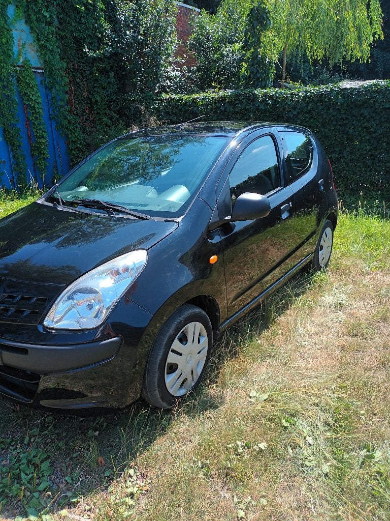 TE KOOP NISSAN PIXO  1000 CC BENZINE WEINIG KM  96.000, Autos, Nissan, Achat, 4 portes, Noir, Particulier