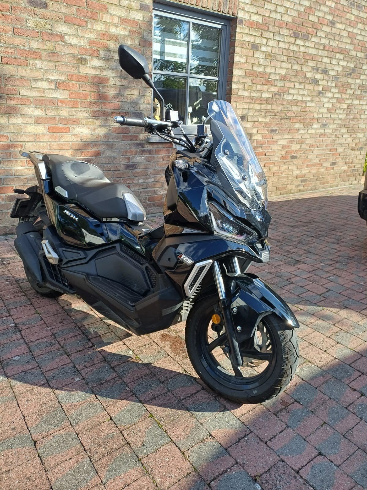 SYM ADX 125m³ noir, Enlèvement