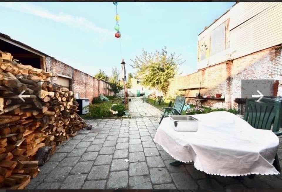 Grote wining met grote garage en tuin met veel mogelijkheden