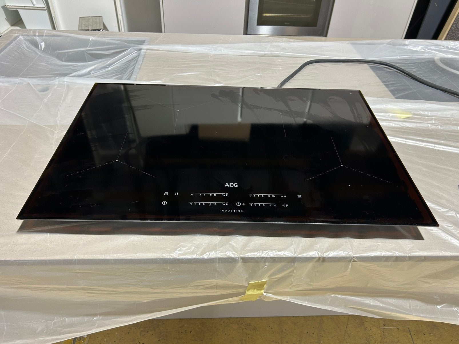 AEG inductiekookplaat van 78 cm. Jaar 2022, Elektronische apparatuur, Ophalen, Zo goed als nieuw, Inductie