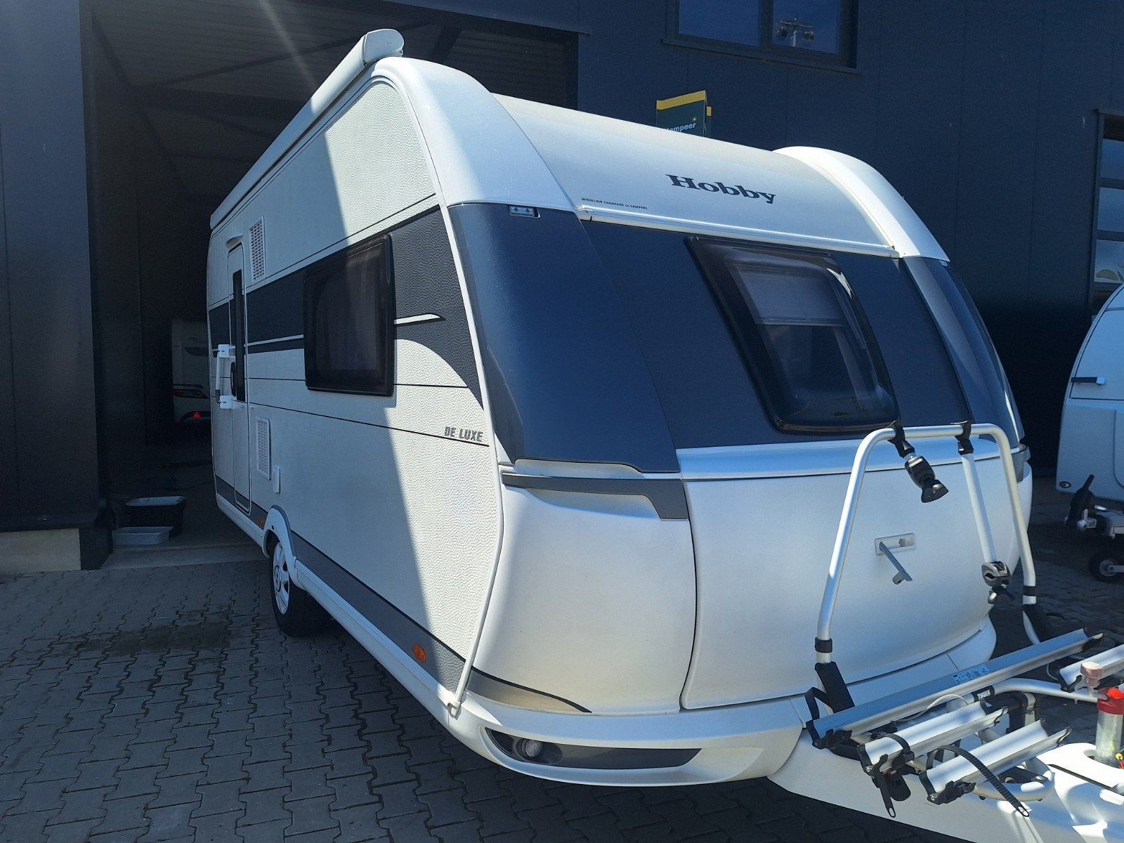 Hobby 460 SFF - 2021 -  Cassetteluiffel - Mover - 1500kg max, Caravans en Kamperen, Hobby, Bedrijf, Luifel, Queensbed