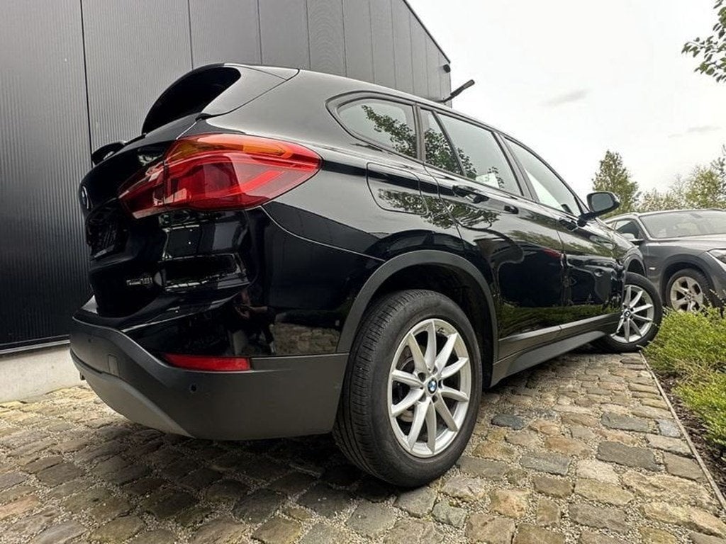 BMW X1 sDrive18i /GPS/verw stoel/PDC/elektr koffer/ Euro6/G, X1, Zwart, Bedrijf, 140 pk