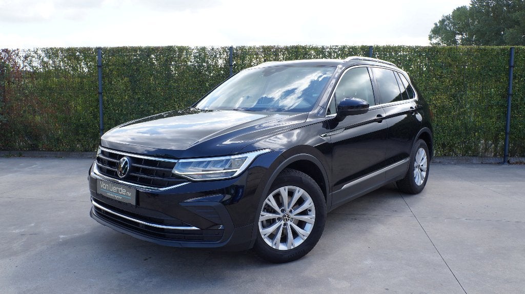 Volkswagen Tiguan 1.5 TSI 150pk DSG Trekh Pdc Navi Carplay, Auto's, Stof, 4 cilinders, Zwart, Bedrijf