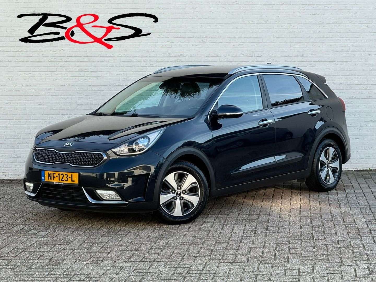 Kia Niro 1.6 GDi Hybrid First Edition Trekhaak Camera Carpla, Auto's, Automaat, 88 g/km, Zwart, Blauw