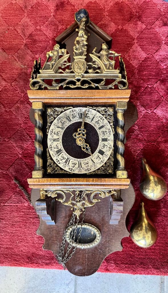 WUBA wandklok, Ophalen