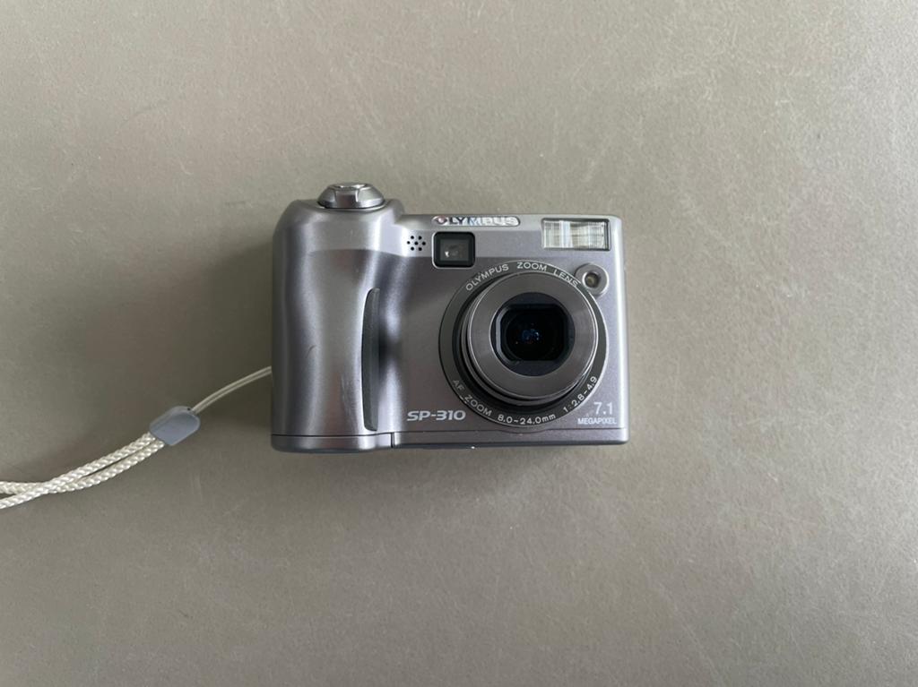 Olympus sp-310, Audio, Tv en Foto, Fotocamera's Digitaal, Ophalen of Verzenden, Zo goed als nieuw, Olympus