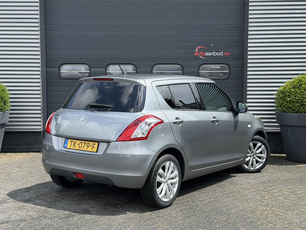 Suzuki Swift 1.2 Exclusive | Airco | Lichtmetalen Velgen | C, Auto's, Suzuki, Euro 5, Stof, Gebruikt, 4 cilinders