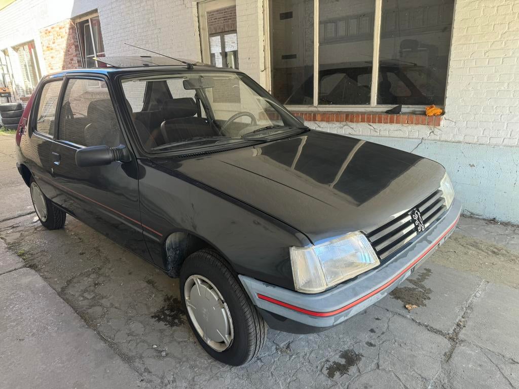 Peugeot 205 1.4 benzine bj 1992 km 109.868 mooie auto, Auto's, Voorwielaandrijving, Open dak, Bedrijf, Handgeschakeld