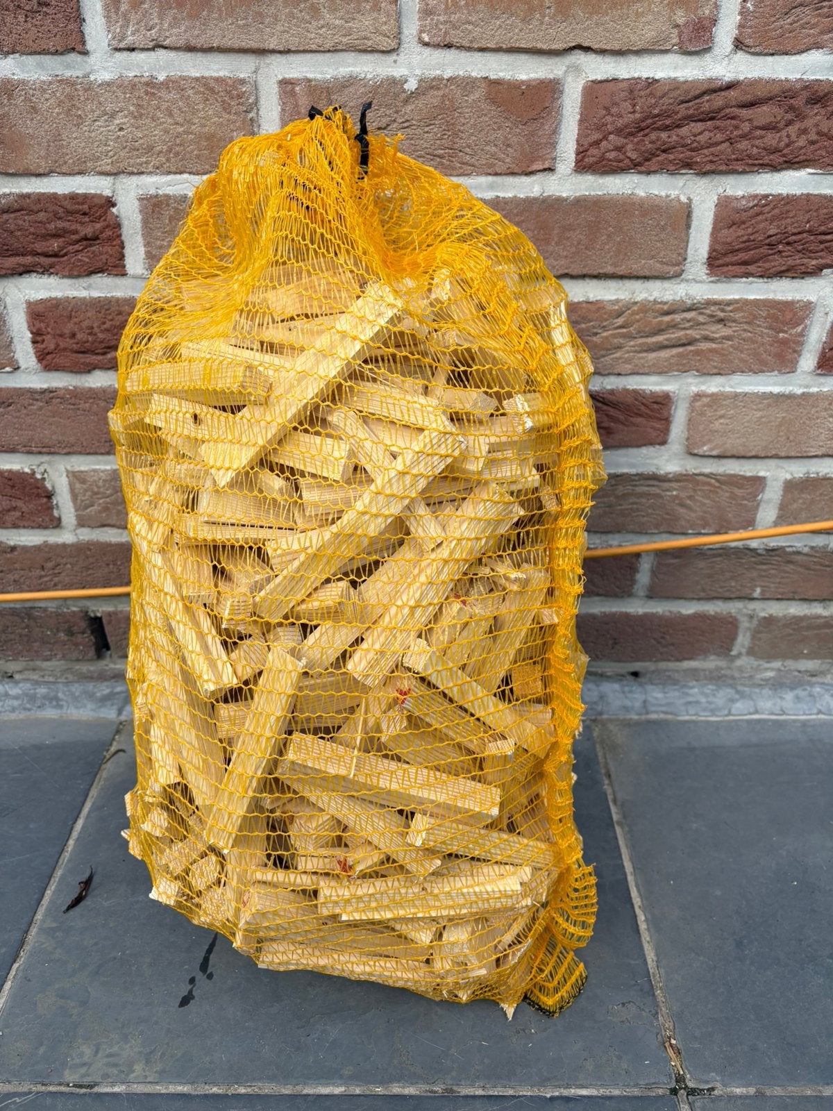 Sac de petit bois d'allumage (Pin sec), Enlèvement