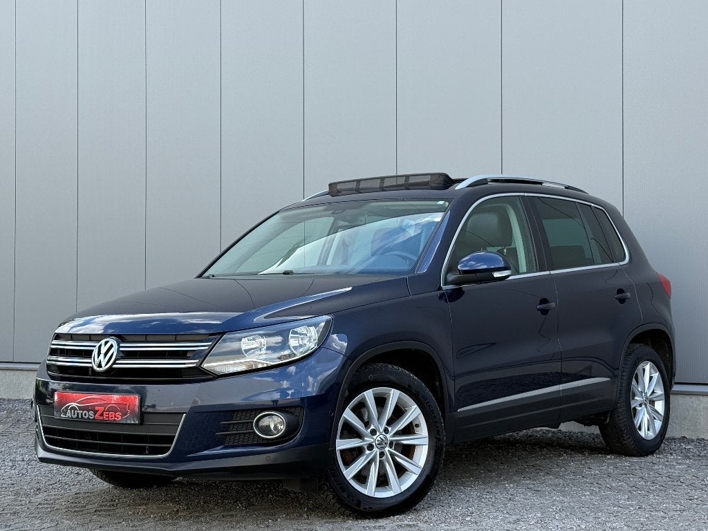 Volkswagen Tiguan 2.0TDi Pano ElekZetel Cruise Navi DigAirco, Auto's, Voorwielaandrijving, Euro 5, Zwart, 4 cilinders