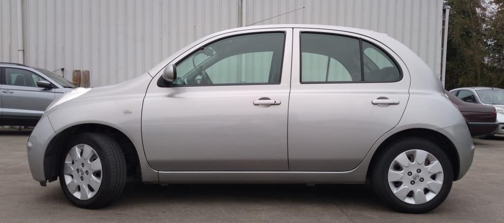 Nissan Micra 1.3 Benzine (Automaat), Elektrische buitenspiegels, Stof, Zwart, 4 cilinders