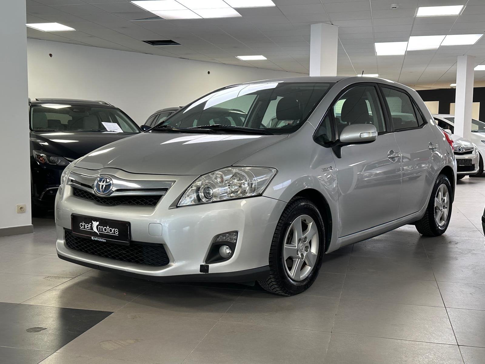 Toyota Auris 1.8 Hybrid Life | Hybride | CVT | Navigatiesyst, Auto's, Toyota, Euro 5, Stof, Gebruikt, 4 cilinders
