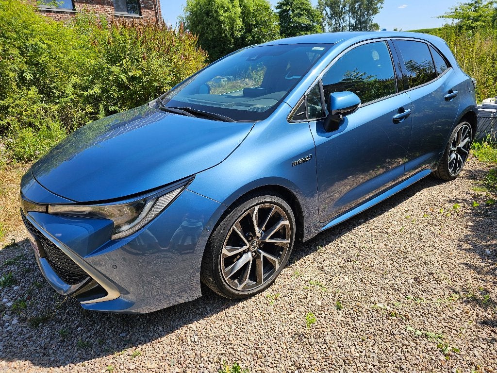 Toyota Corolla 1.8 Hybride – 2019 – 141.000 km, Auto's, Dealer onderhouden, 4 cilinders, 72 kW, Blauw