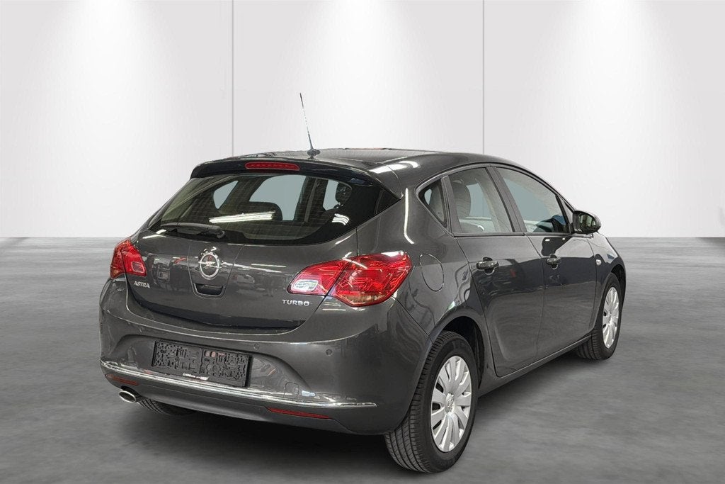 Opel Astra 1.4 Turbo 103kW Aut. Sport, Auto's, Opel, Euro 5, Gebruikt, Bruin, Bedrijf