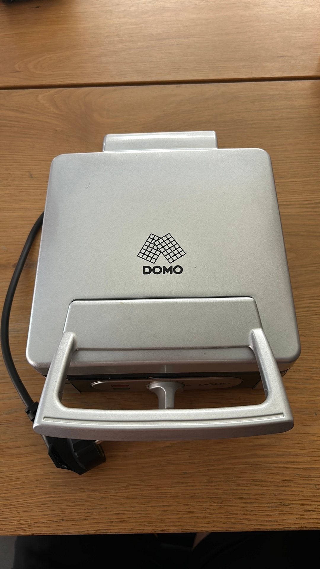 Domo wafelijzer, Enlèvement, Utilisé