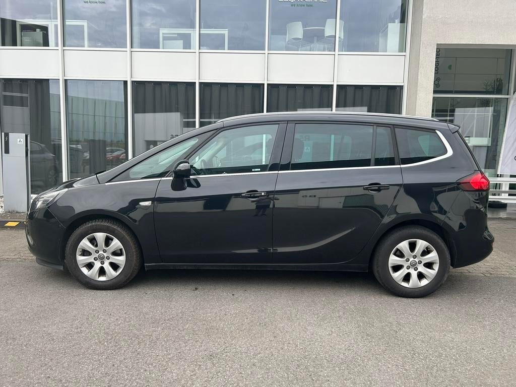 Opel Zafira 1.4i met 95000km in goede staat, Monovolume, Leder en Stof, Zwart, Bedrijf