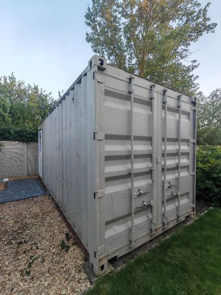 Bureau of werkplaats container, Ophalen