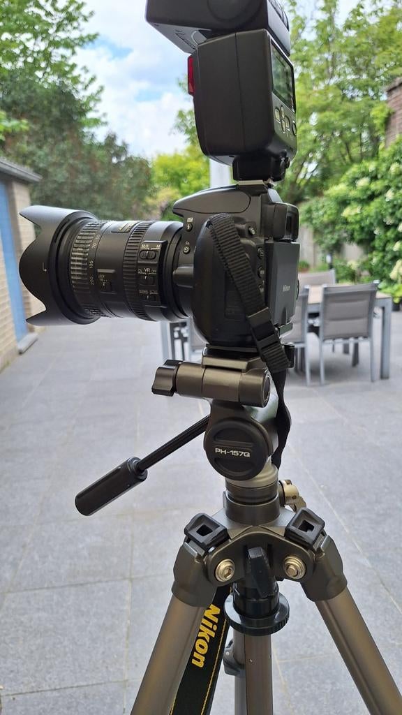 Fotocamera Nicon., Ophalen
