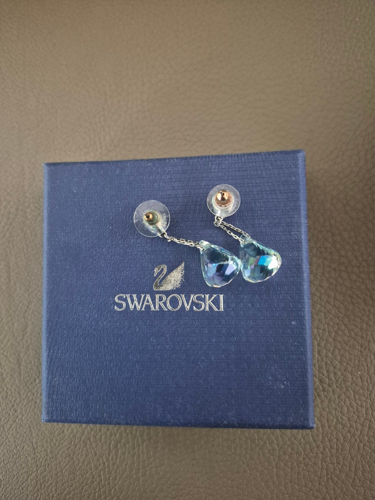 swarovski oorringen, Ophalen