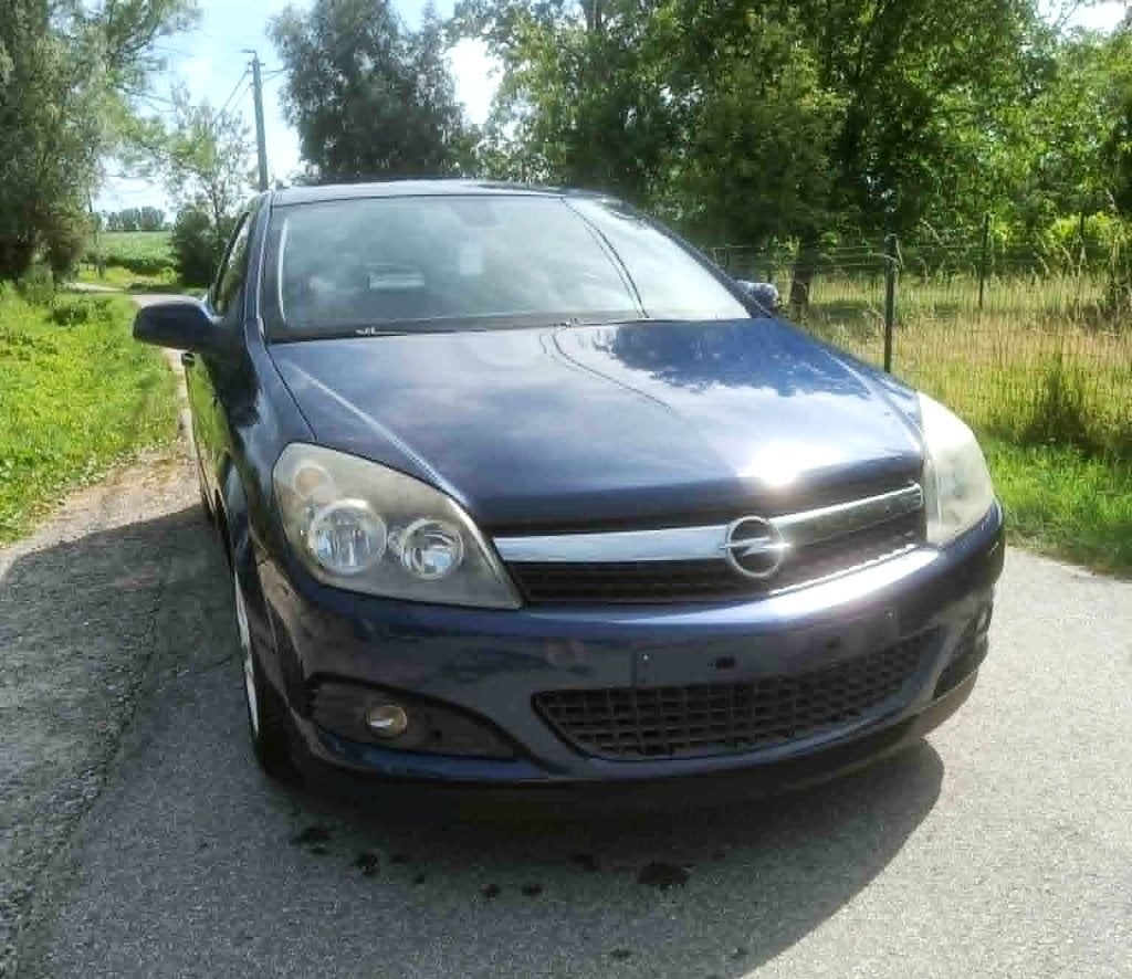 Opel Astra GTC 1.4i Airco, Auto's, Stof, Zwart, 4 cilinders, Blauw