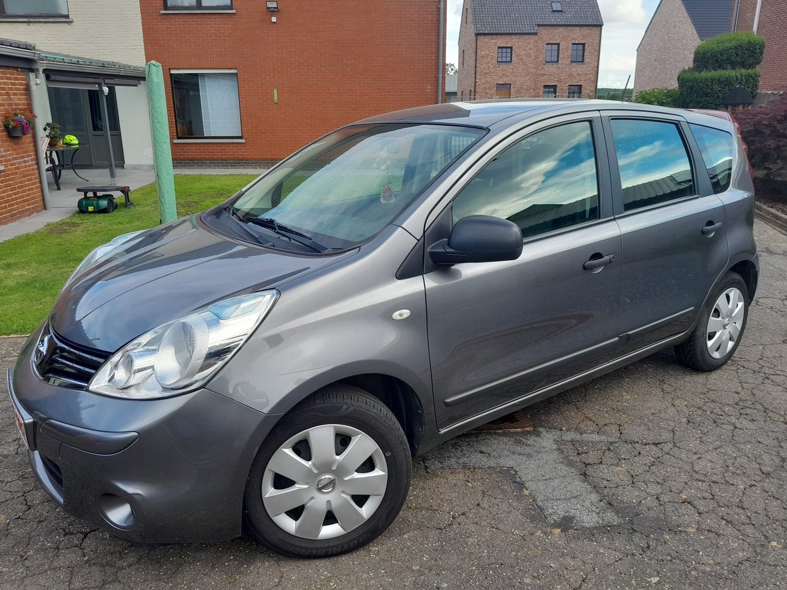 Nissan Note 1.4 benzine 82000km, Auto's, Nissan, Voorwielaandrijving, Euro 5, Stof, 4 cilinders
