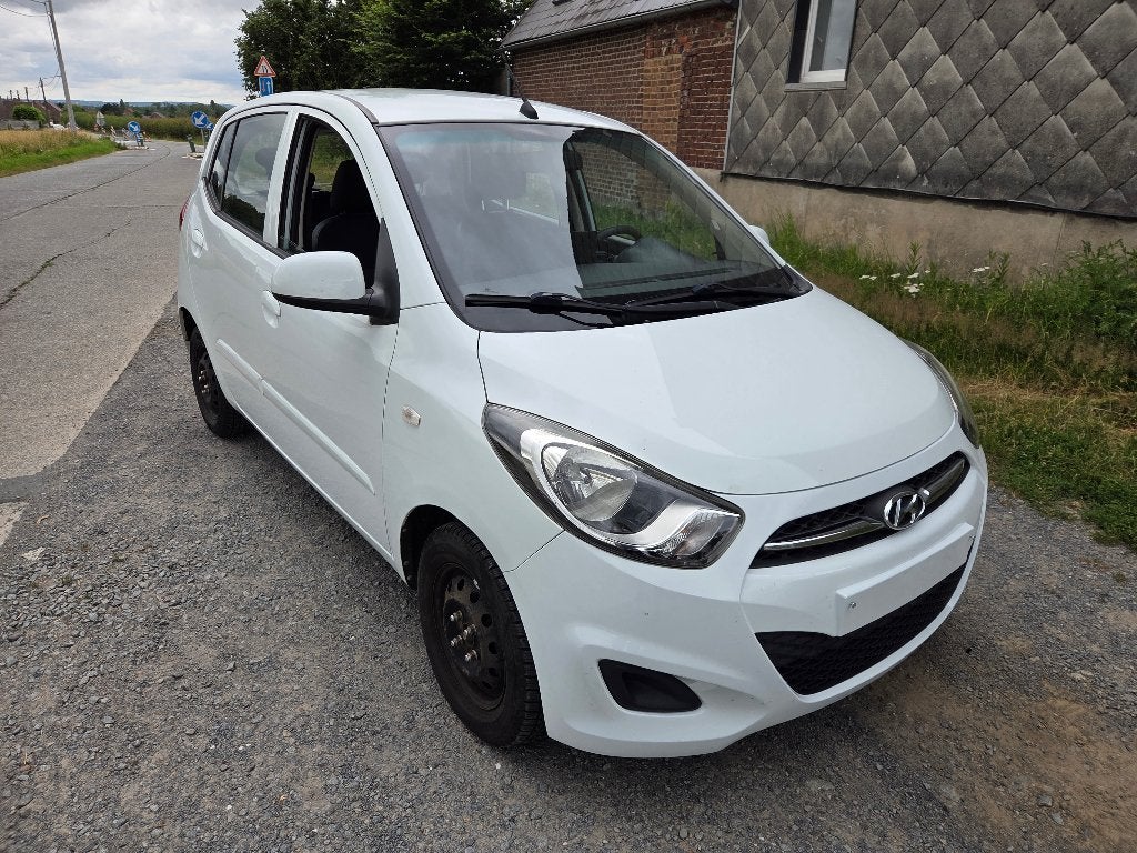 Hyundai i10 2014 94429 km garantie 1 an, Auto's, Hyundai, Voorwielaandrijving, Stof, Zwart, 4 cilinders