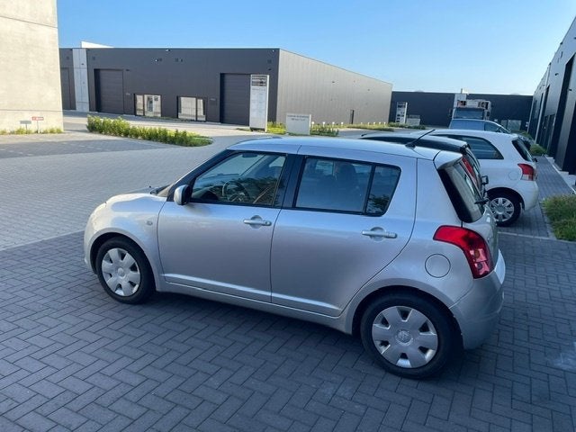 Suzuki Swift 1.3I Comfort, 5 deurs, Airco, Eerste eigenaar, Auto's, Suzuki, Voorwielaandrijving, Elektrische ramen, Stof, 140 g/km