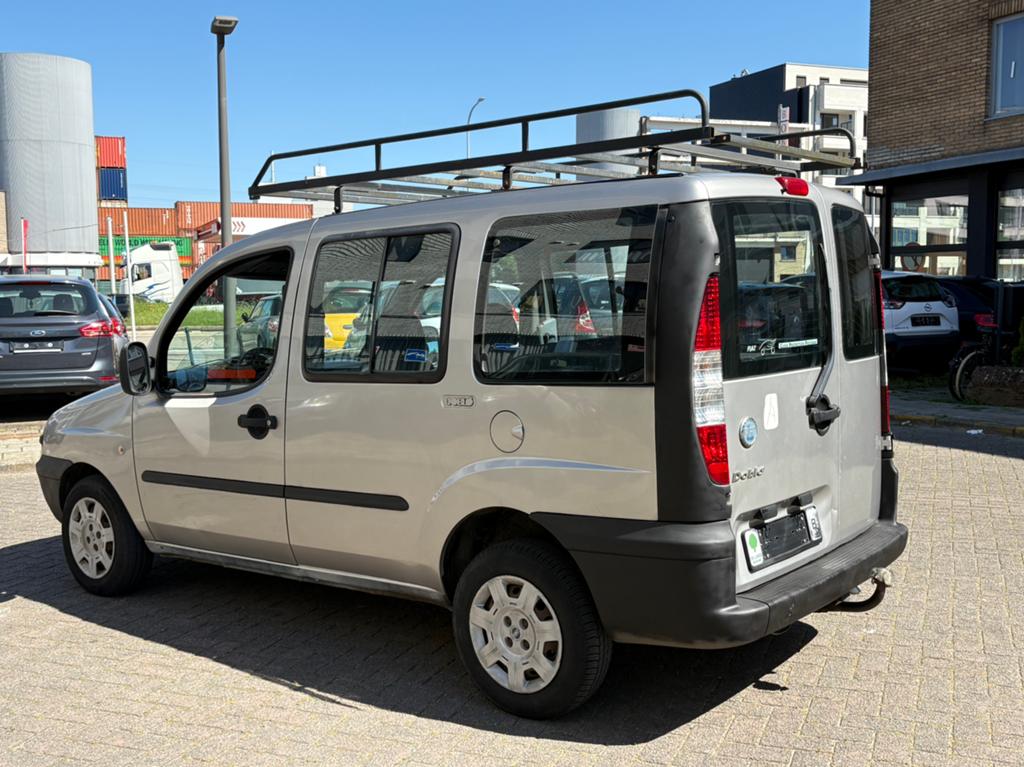 Fiat Doblo. 1.3 Benzine.  Met 58.000 km 1ste eigenaar, 4 deurs, Monovolume, 4 cilinders, https://public.car-pass.be/vhr/33da58bb-ddcf-4f93-9f25-d0285db4dfbe