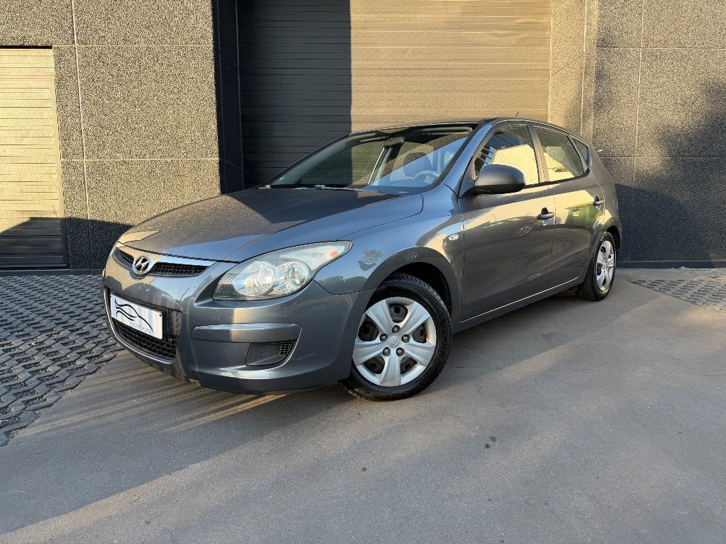 Hyundai I30 1.4 benzine | airco | 12M garantie | TOPAANBOD, Auto's, Hyundai, Voorwielaandrijving, Stof, Zwart, Bedrijf