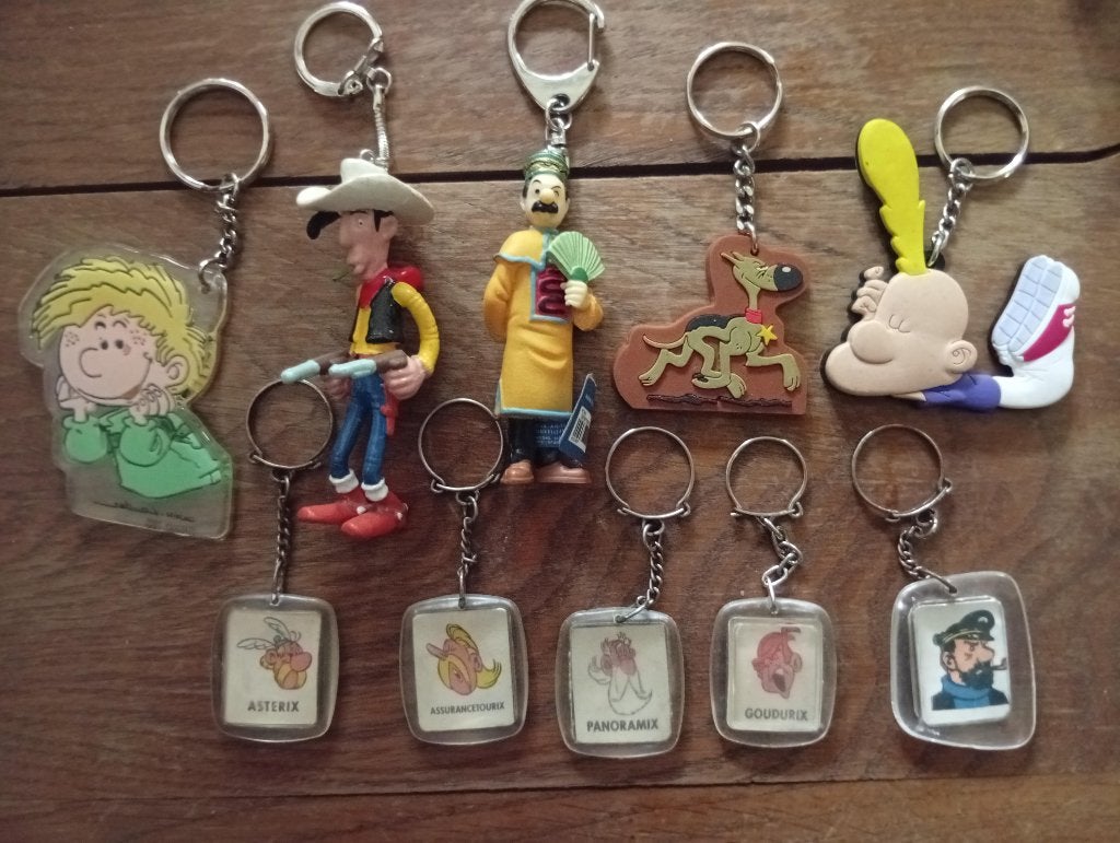 9 porte-clefs sur le thème de la bande dessinée (pièce/lot)., Collections, Enlèvement ou Envoi, Autres personnages, Neuf, Autres types