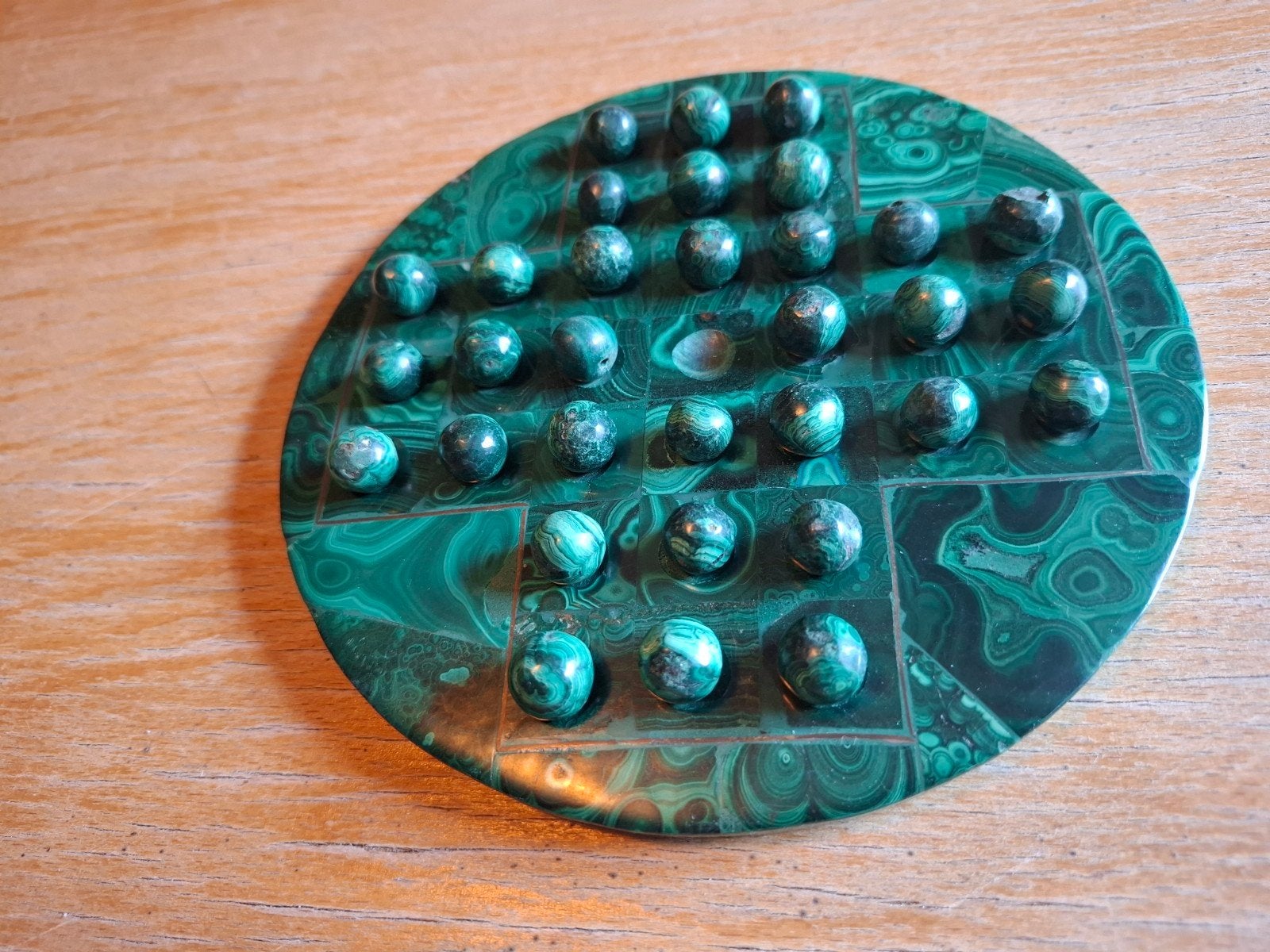 Vieux jeu du Solitaire en malachite, Enlèvement