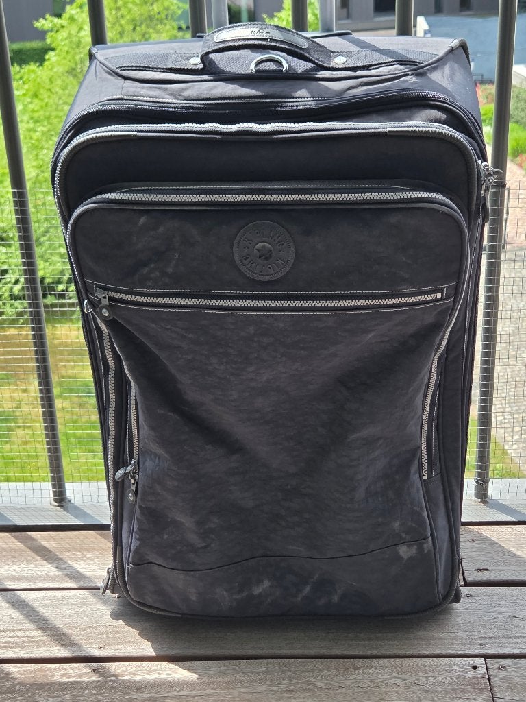 Kipling donkerblauwe rolkoffer 70 L - prima staat, Handtassen en Accessoires, Koffers, Zo goed als nieuw, Zacht kunststof, 60 tot 70 cm