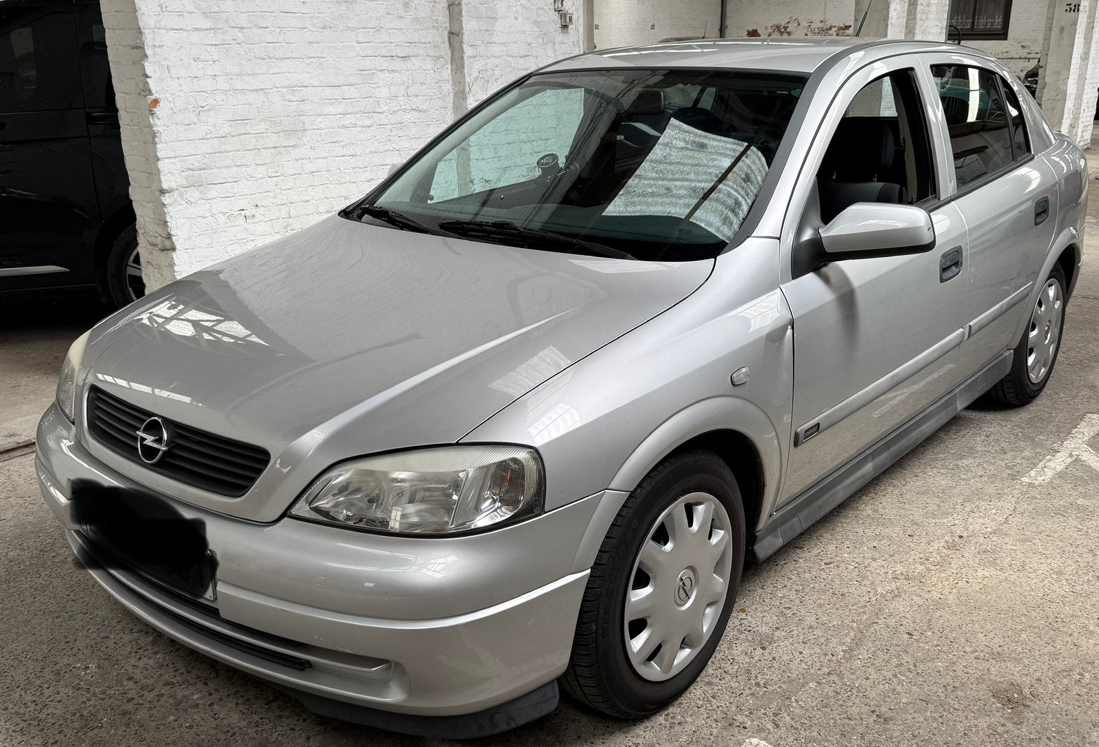 Opel Astra 1.4 Essence Euro 4 km 119000, Autos, 1395 cm³, Argent ou Gris, Achat, Boîte manuelle