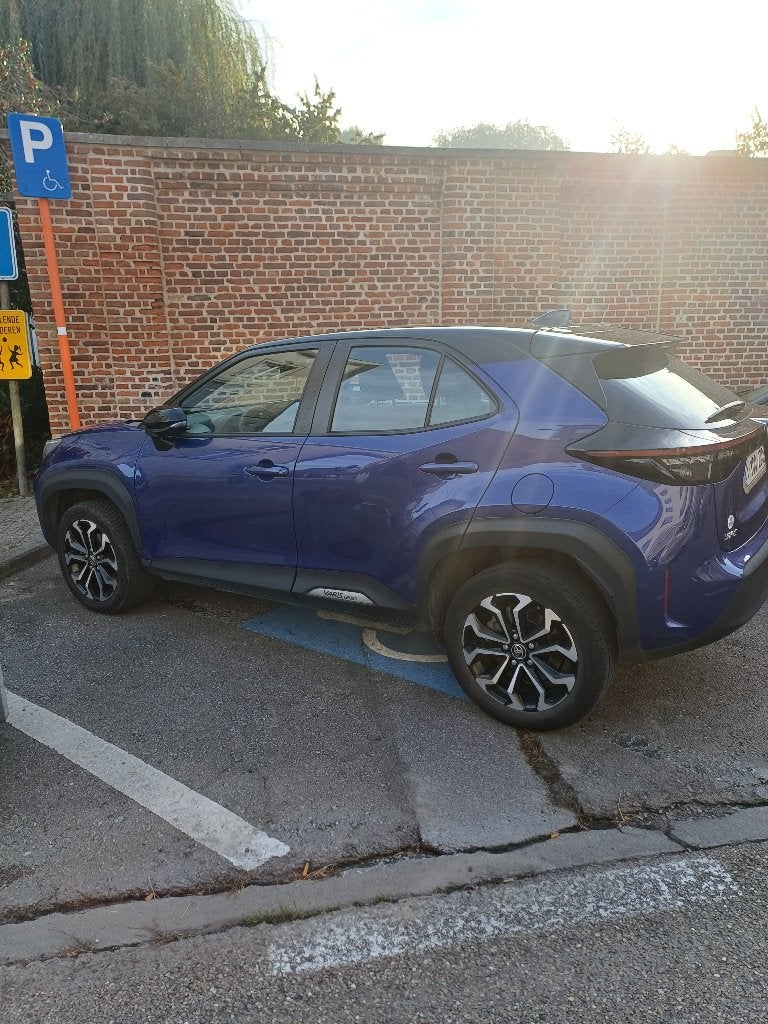 ToyotaYaris Cros Dynamic Plus 1,5 Hybrid Automaat, Auto's, Stof, Euro 6, Bi-Xenon koplampen, Blauw