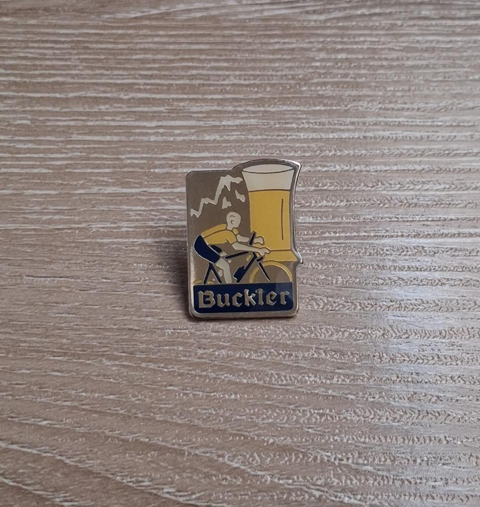PIN - BUCKLER - BIER - BIÈRE - BEER - WIELRENNEN, Envoi, Utilisé, Marque, Insigne ou Pin's
