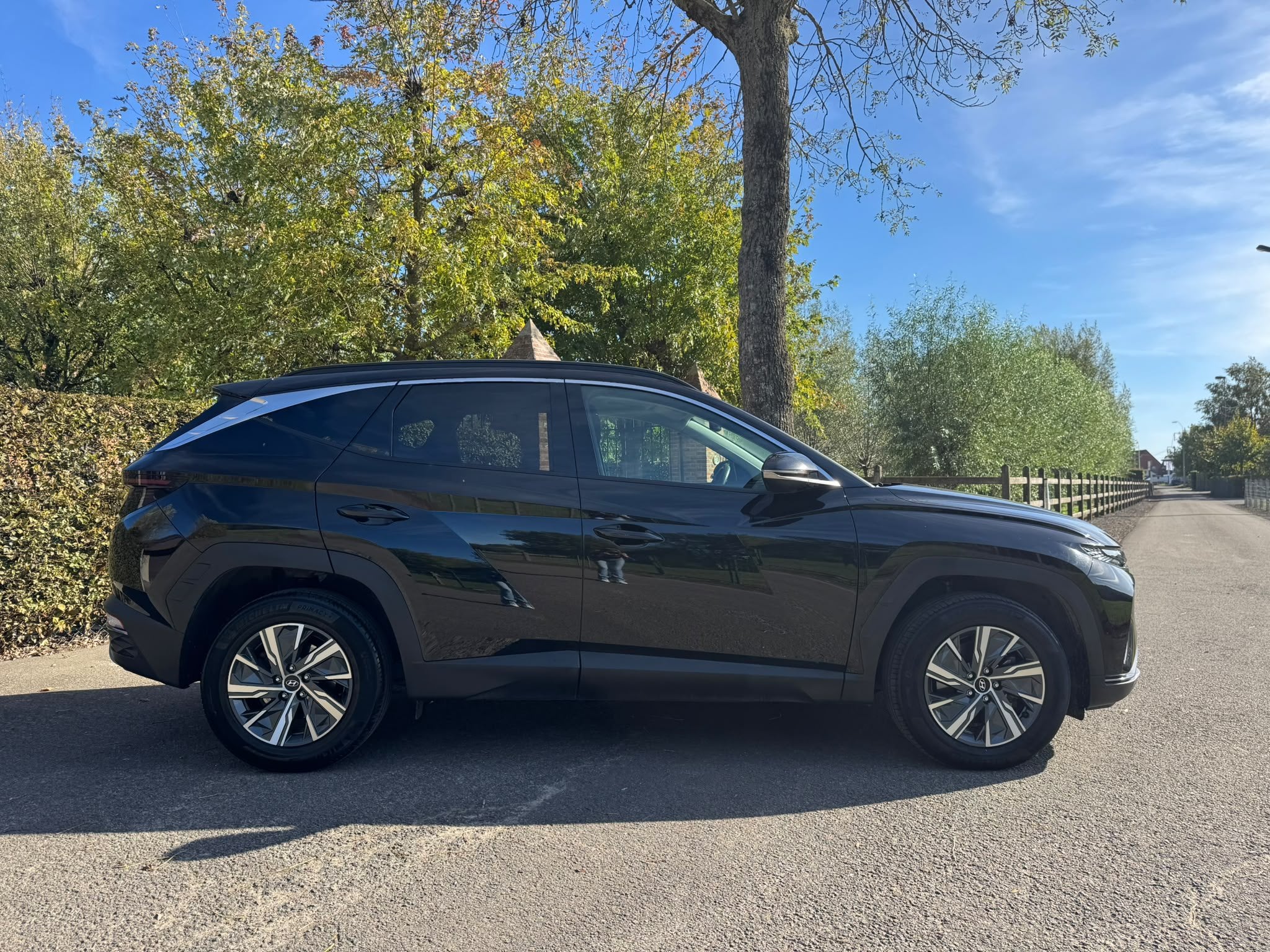Hyundai NX4 TUCSON HEV FEEL - hybride automaat (bj 2021), Auto's, Stof, Gebruikt, 169 kW, Bedrijf