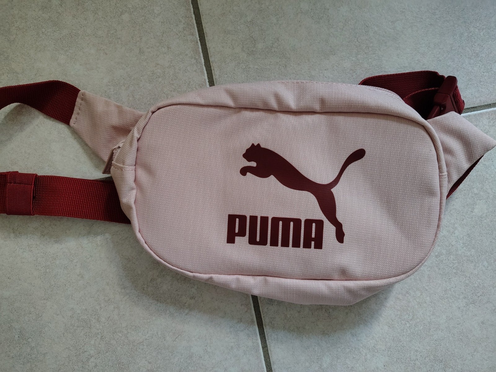 Heuptasje Puma, Ophalen