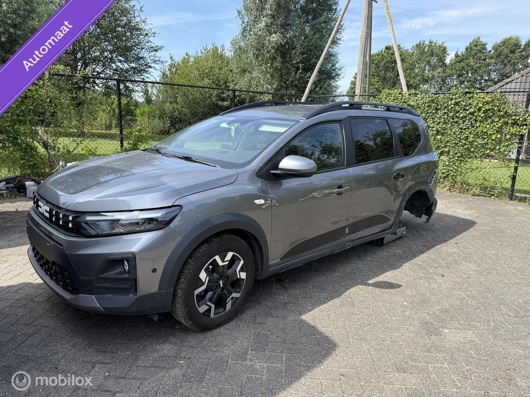 Dacia Jogger 1.8 Hybrid Automaat 7 Persoons 2026 € 15.900,, Autos : Divers, Voitures accidentées, Dacia, Argent ou Gris, DACIA
