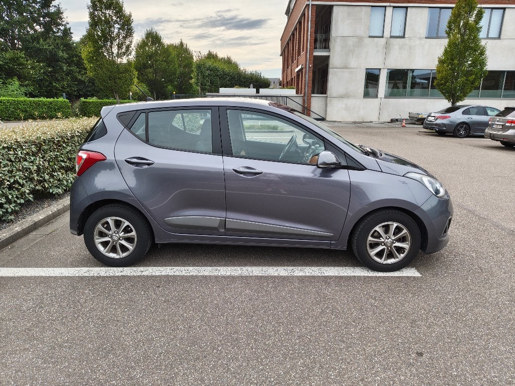 Hyundai i10 - 71.273 km - inschrijvingsjaar 2016, Stof, Bluetooth, Bruin, Particulier
