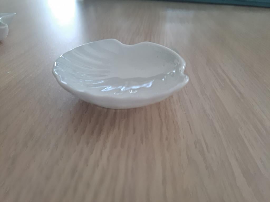 Aperitiefschaaltjes., Ophalen