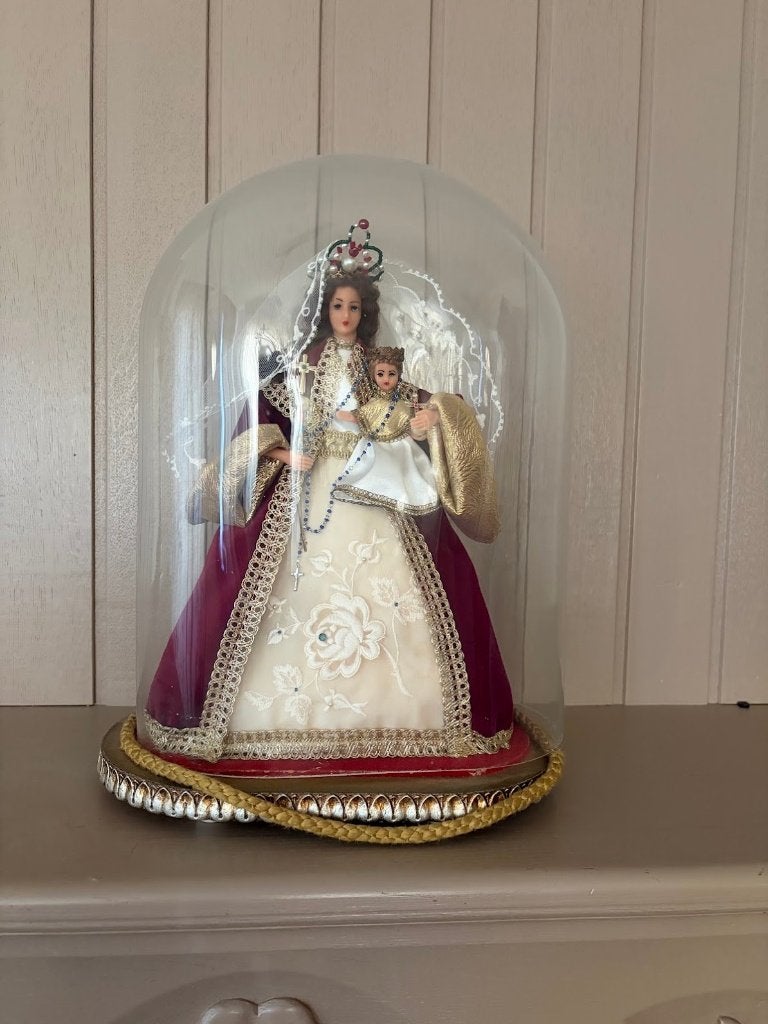Mariabeeld met jezus onder stolp, Enlèvement
