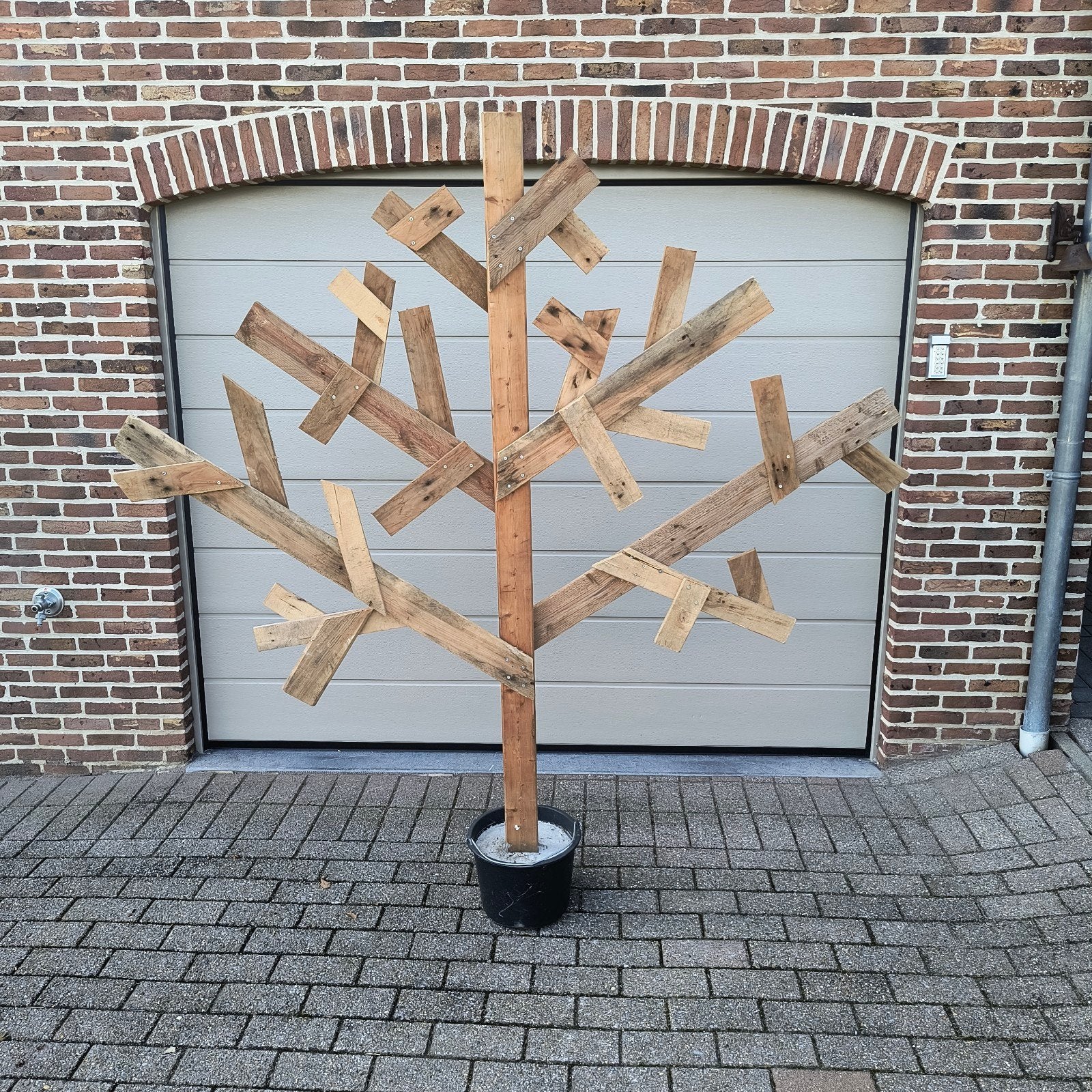 houten kerstboom, Enlèvement