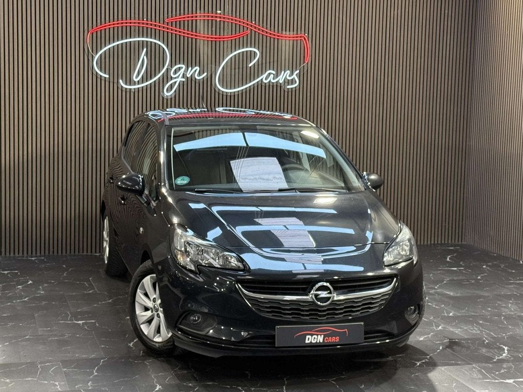 Opel Corsa Corsa 1.4i Black Edition (bj 2015), Auto's, Stof, Gebruikt, 4 cilinders, Zwart